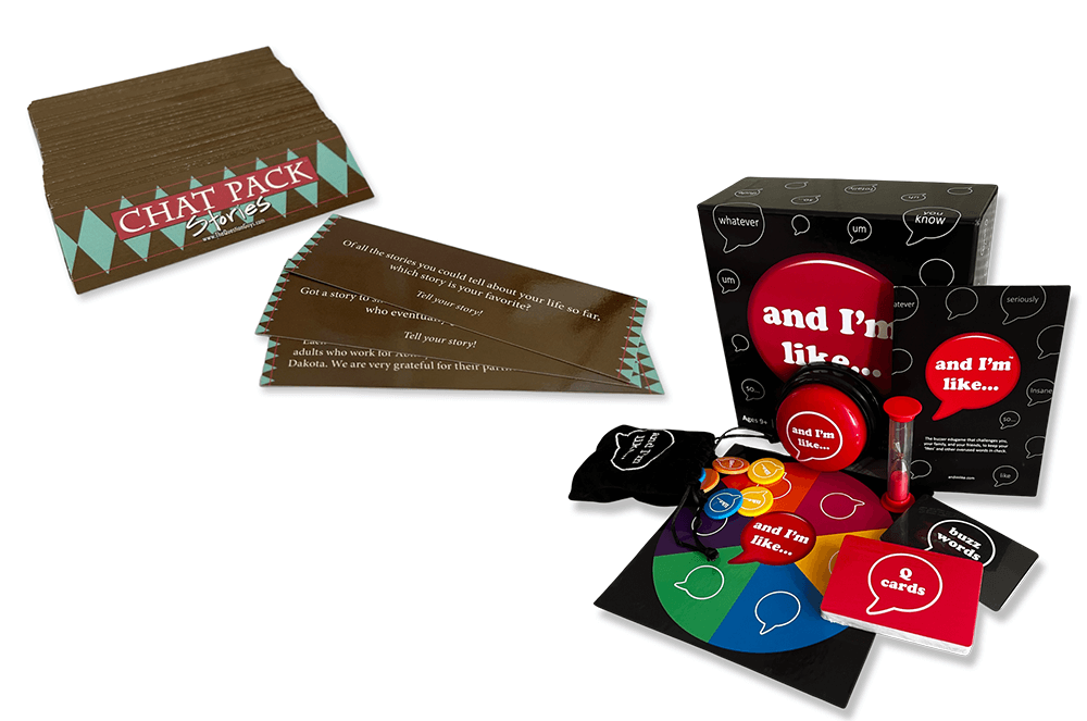 Two boxes containing public speaking games with cards, board, and timer