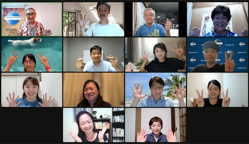 Group of people making hand gestures during online meeting